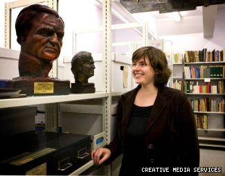 Digital and Special Collections Librarian Annie Murray shares a glance with a bust of poet Irving Layton in the archives at Vanier Library. The statue will be displayed at Layton Out Loud on Oct. 1. Aside from library and archive staff, “these things probably haven’t been seen by anyone in thirty years,” says Murray.